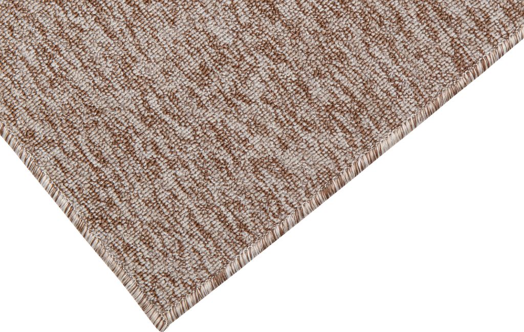 A close-up view of a rug with a melange pattern.