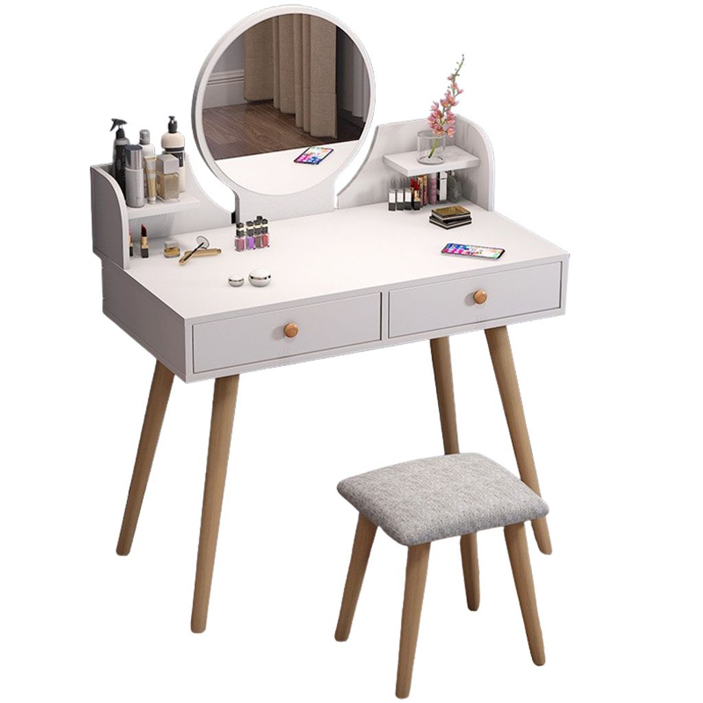 A white vanity table with a round mirror and a stool, set against a white background.