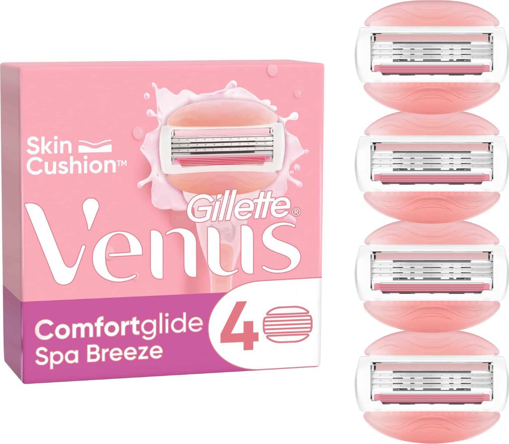 A package of Gillette Venus Comfortglide Spa Breeze women's razor blades and several individual razor blades.