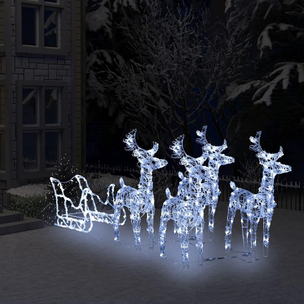 A nighttime outdoor scene with illuminated Christmas decorations.