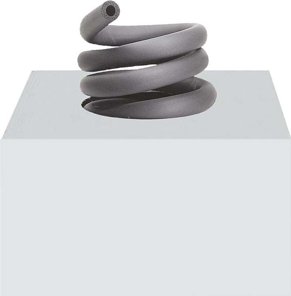 A coiled gray pipe insulation is shown resting on a white cube.