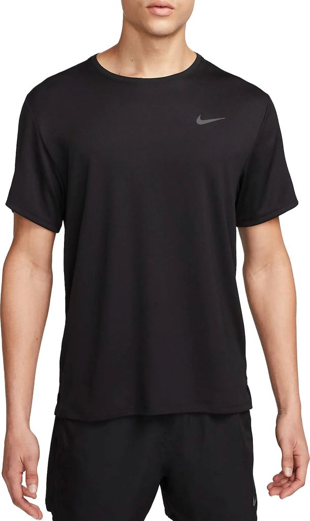 A man wearing a black Nike t-shirt and black shorts.