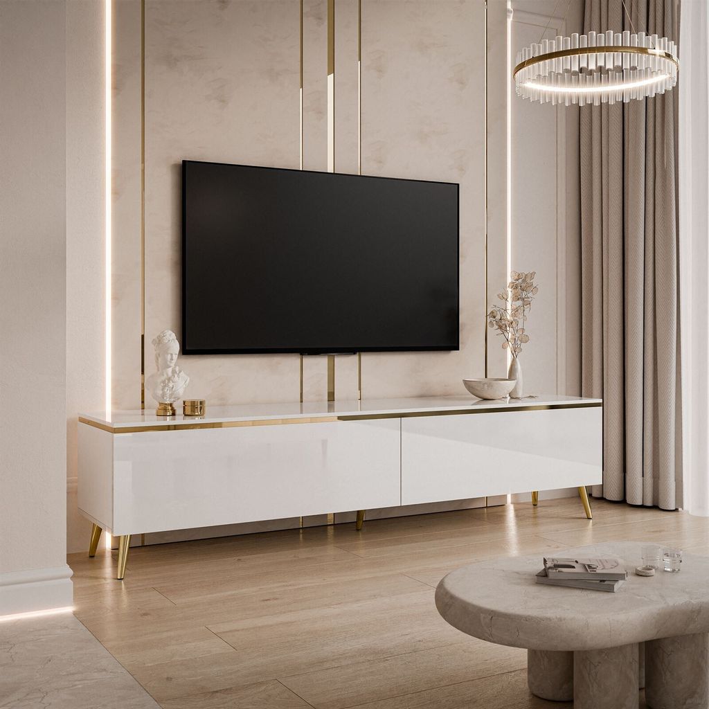 A modern living room with a white, high-gloss TV cabinet and a large flat-screen TV mounted on the wall.