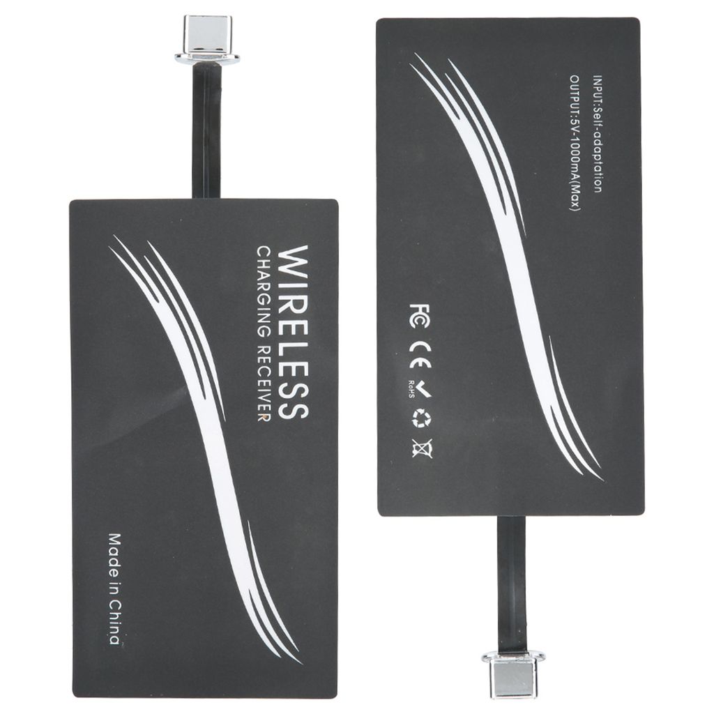 Two black wireless charging receiver adapters are shown side-by-side against a white background.