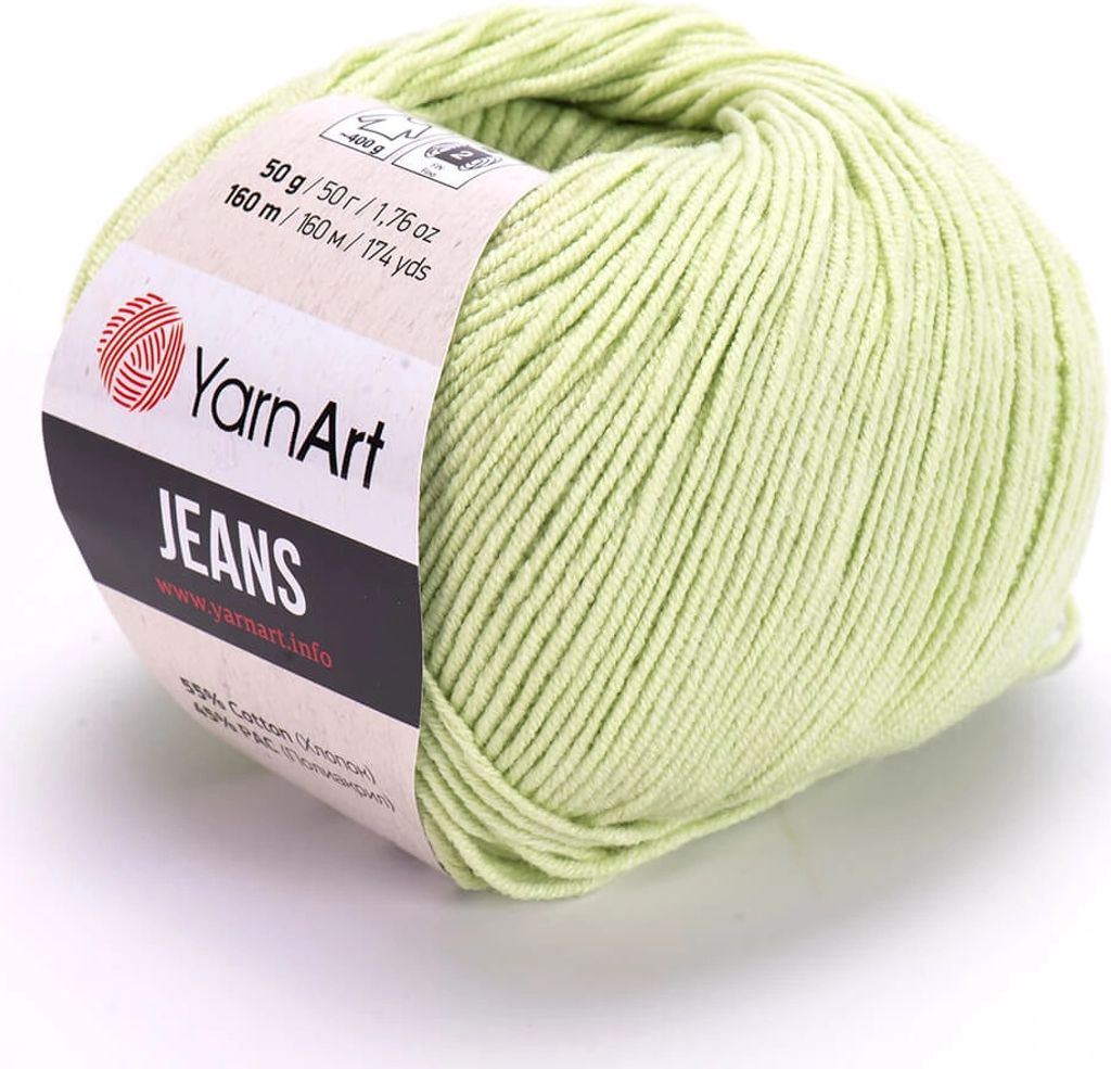 A ball of light green yarn on a white background.