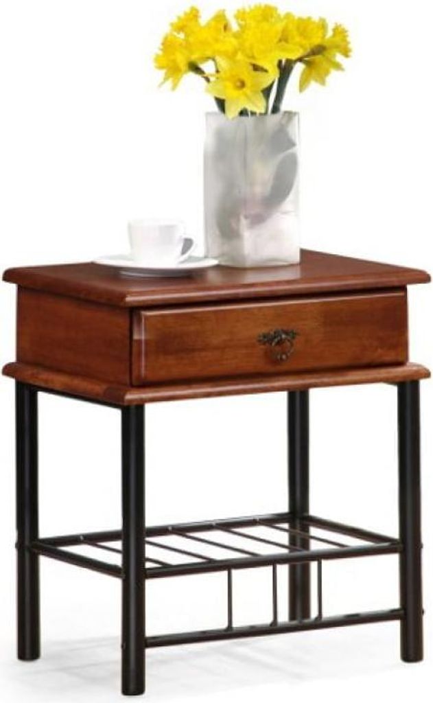 A wooden nightstand with a drawer and a lower shelf, decorated with a vase of yellow flowers and a teacup.