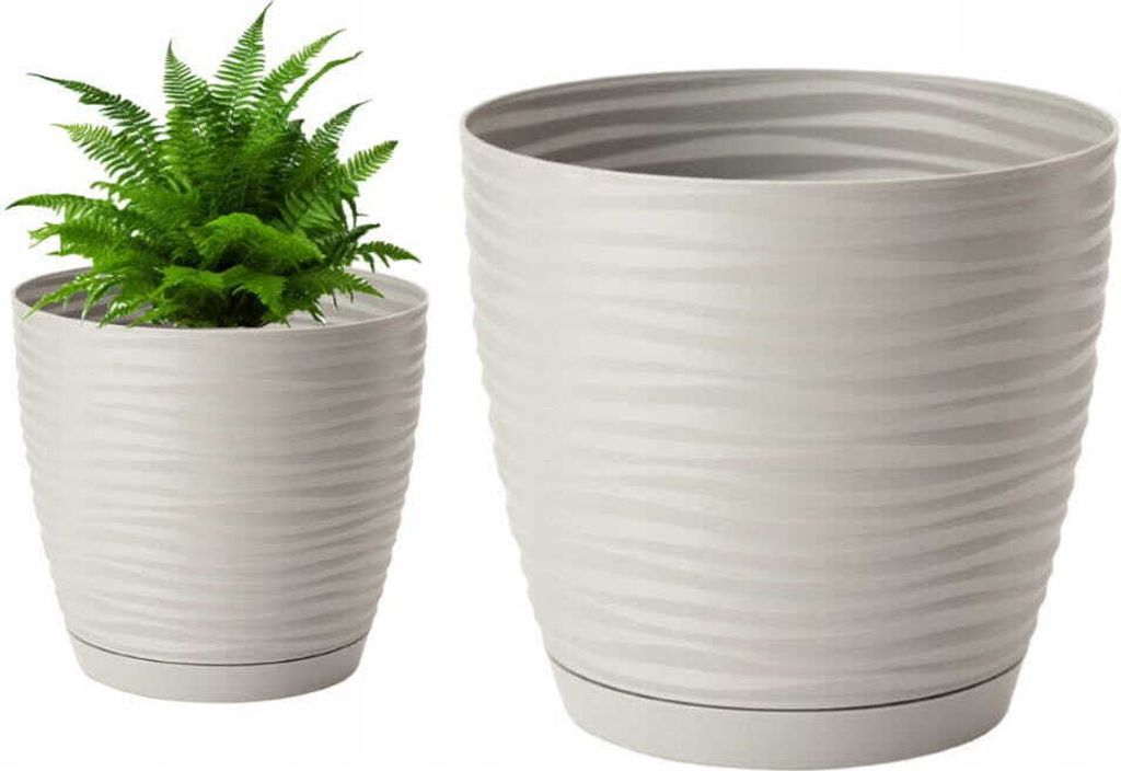 A potted fern sits in a light gray planter next to an empty planter of the same design.
