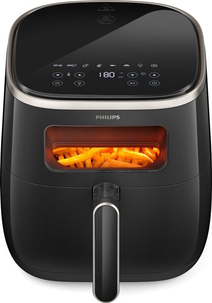 A black Philips air fryer with fries cooking inside.