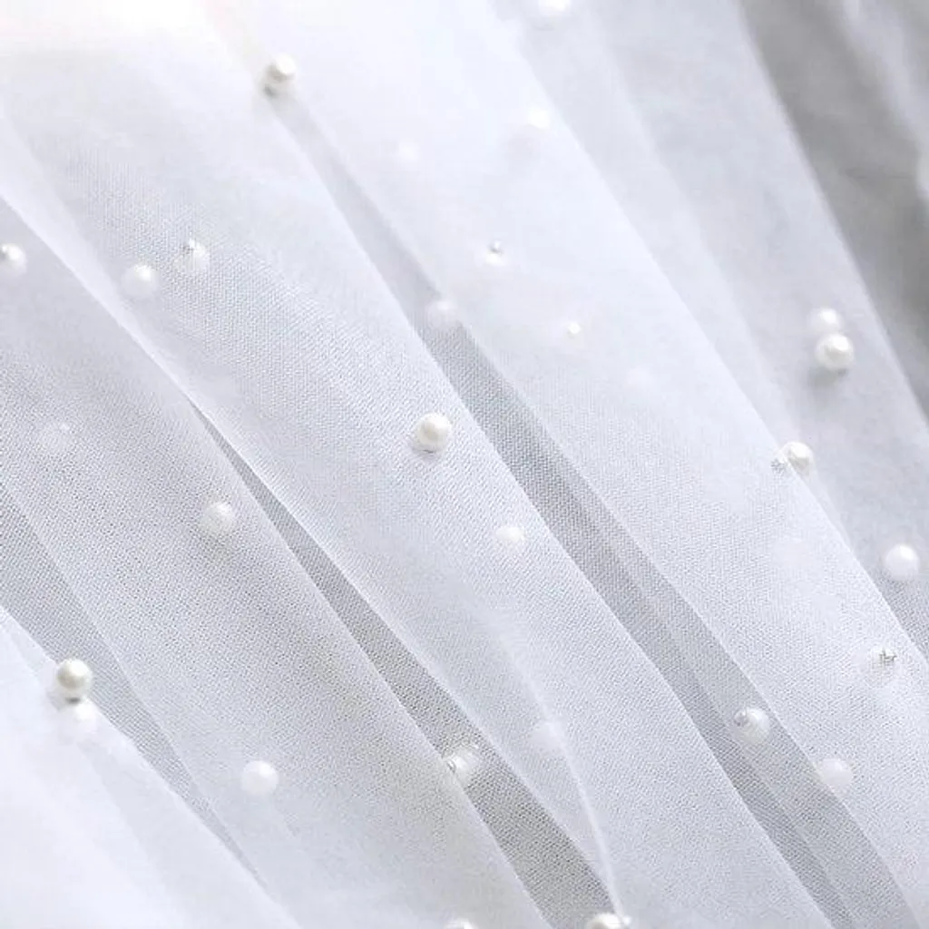 Tulle blanc nacré au mètre 100x160 cm pour voilage et robe de mariée