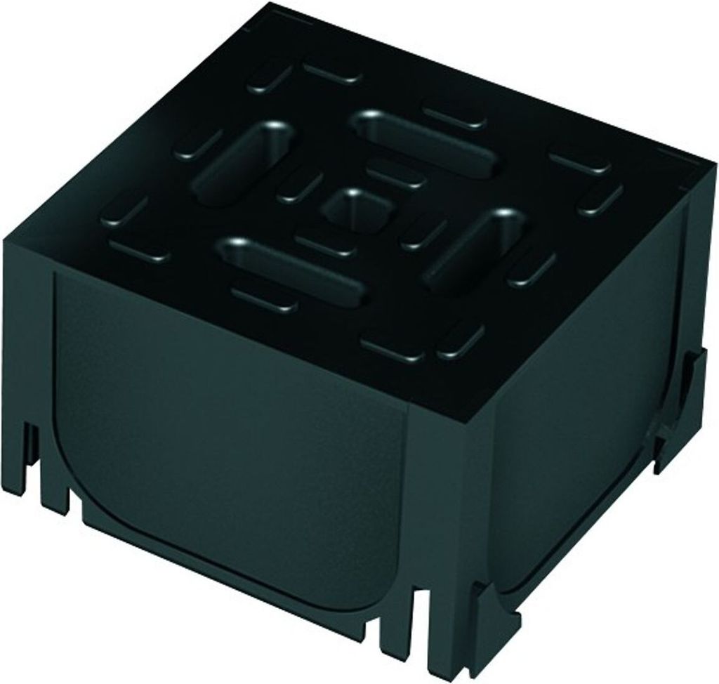 A black plastic corner connector for a drainage channel system.