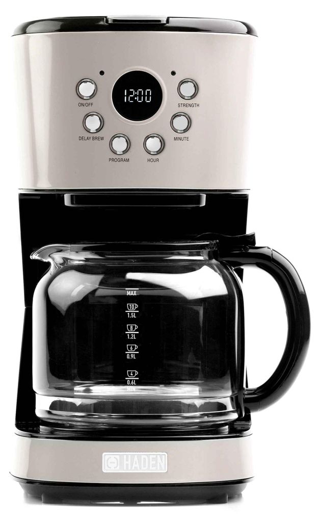 A studio shot of a beige and black Haden Dorset coffee maker.