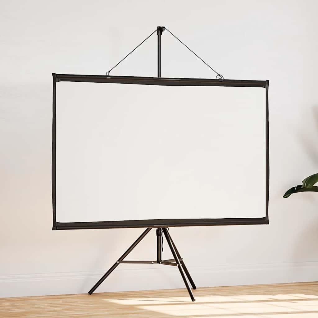 A white projection screen on a black tripod stand against a white wall.