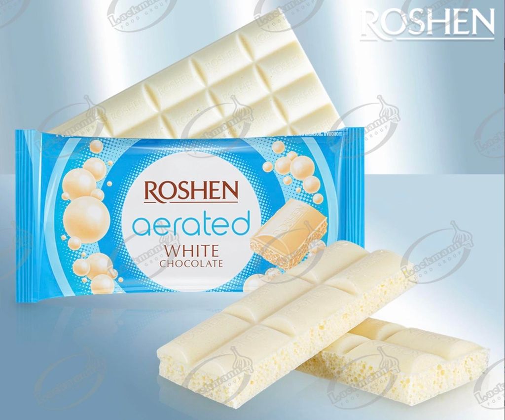 Product packaging and chocolate bars displayed against a gradient background.