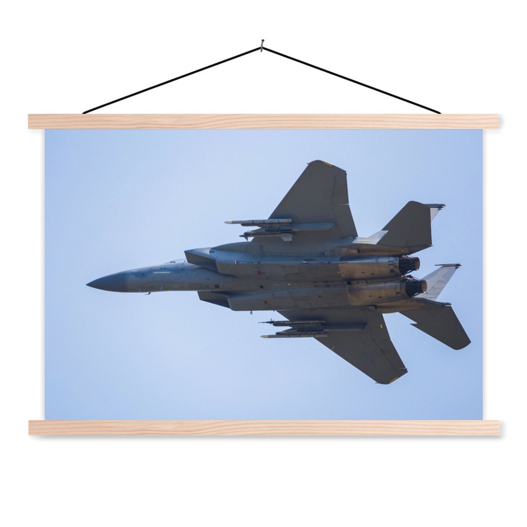 MuchoWow Textilposter Ein weißes Kampfflugzeug am blauen Himmel 120x80 cm mit holzfarbenen Rahmen - Aufhängeset