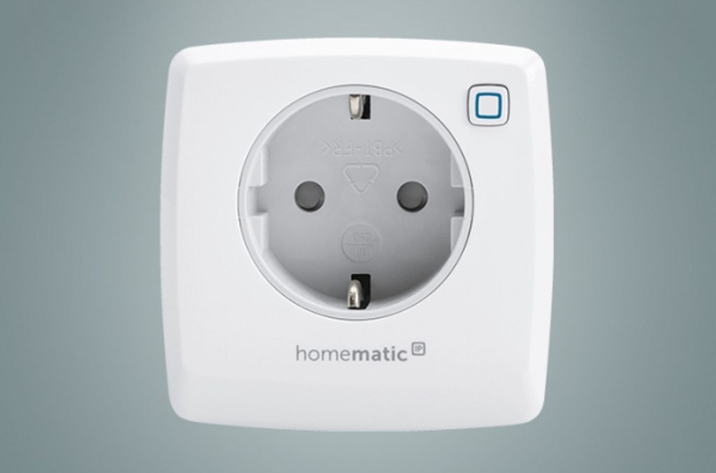 A white smart plug with a European socket and a blue button on a gray background.