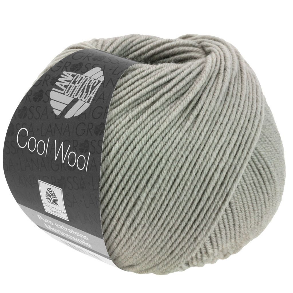 A ball of grey yarn with a label.