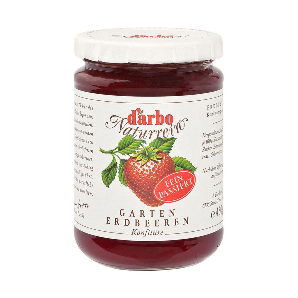 A jar of strawberry jam with a label showing a strawberry and brand information.