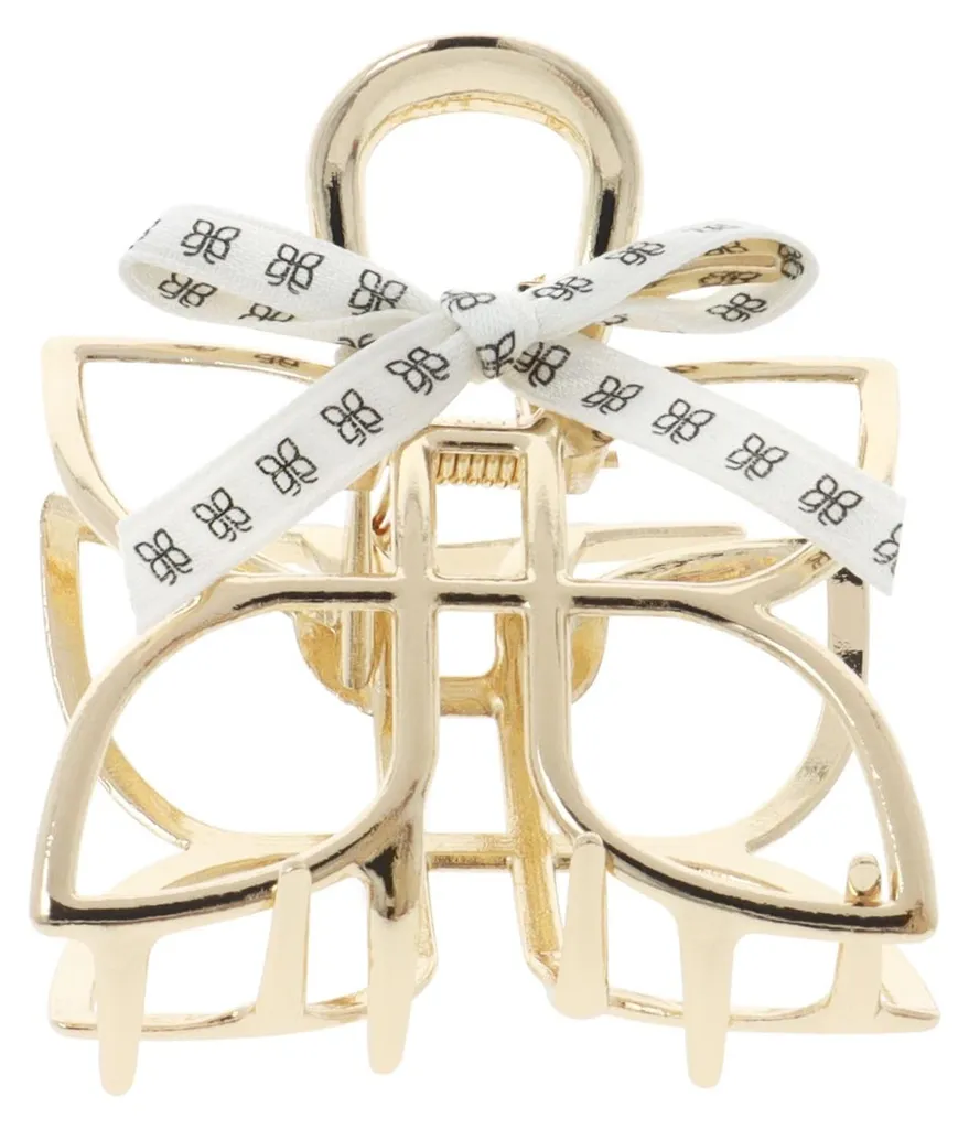 Barrette papillon dorée solide pour maintenir les cheveux avec élégance