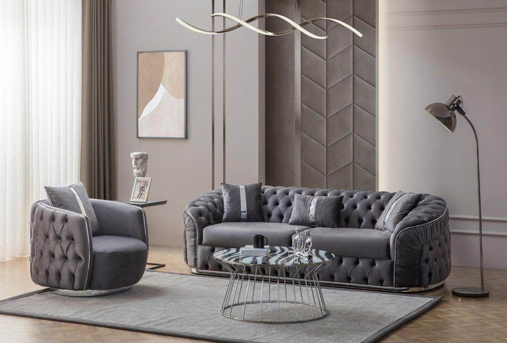 Das Sofa mit Sessel ergänzt die Einrichtung mit Ästhetik und Stil.