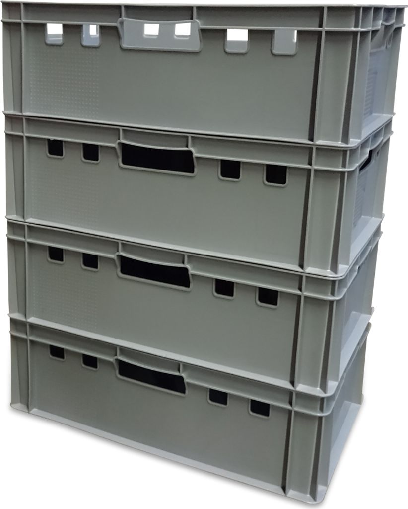 A stack of four gray plastic crates.