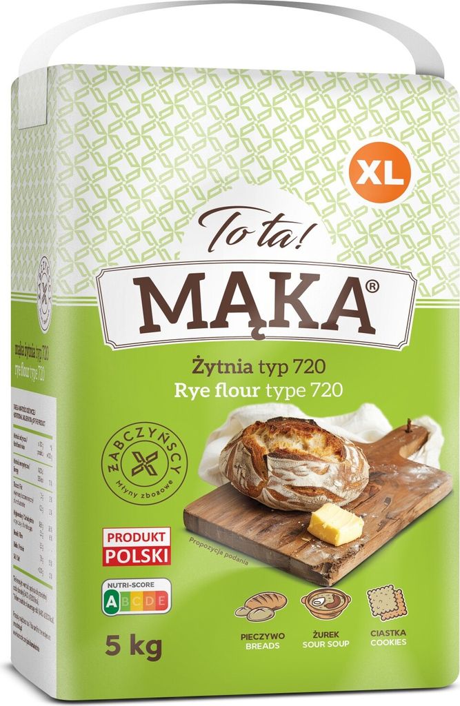 A bag of rye flour with an image of bread and butter on a wooden board.
