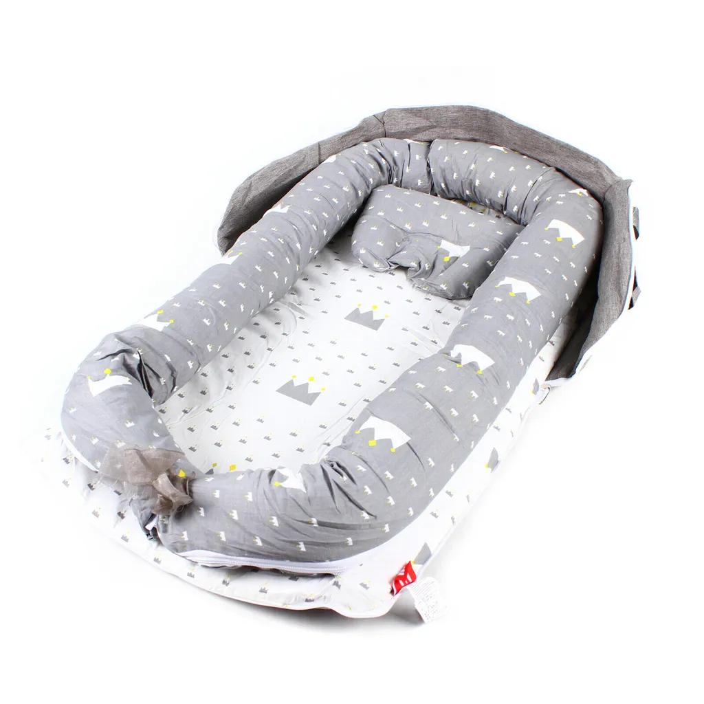 Lit bébé anti-roulis avec clôture de sécurité pour un sommeil sécurisé