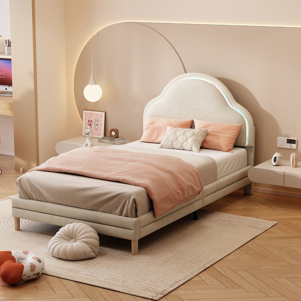 A child's bedroom with a bed, nightstand, and desk.