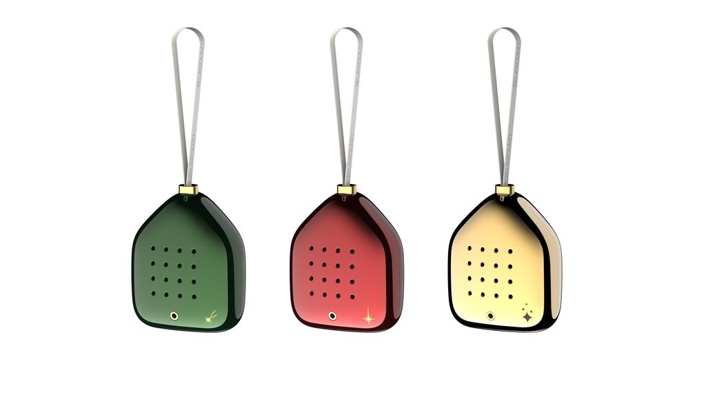 Three decorative ornaments shaped like houses, each with a hanging loop and a perforated front panel.