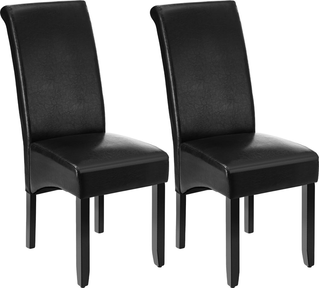 Two black dining chairs are shown against a white background.