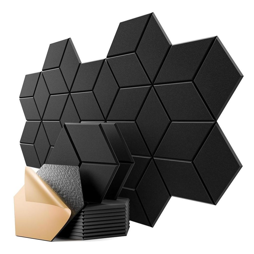 A collection of black acoustic panels arranged in a geometric pattern, with a stack of panels and adhesive backing in the foreground.