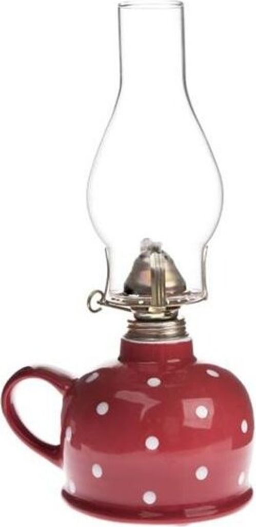 A red polka dot oil lamp with a clear glass chimney.