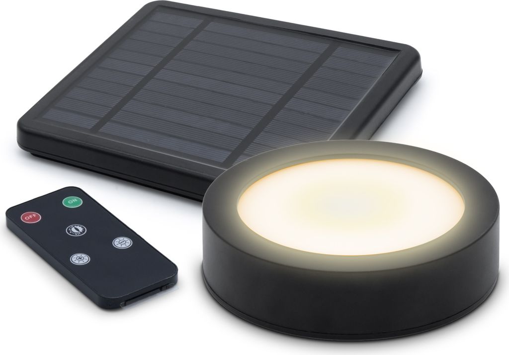 A solar LED light, a solar panel, and a remote control are displayed on a white background.