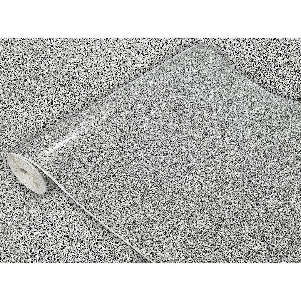 A roll of speckled vinyl wrap is shown, with the pattern appearing to be gray with black flecks.