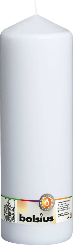 A white pillar candle with a label at the bottom.