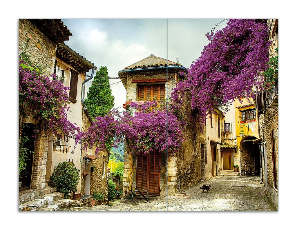 Wallario Herdabdeckplatte aus Glas, Größe 70 x 52 cm 2-teilig, Motiv Malerische Stadt in der Provence mit bunten Blumen