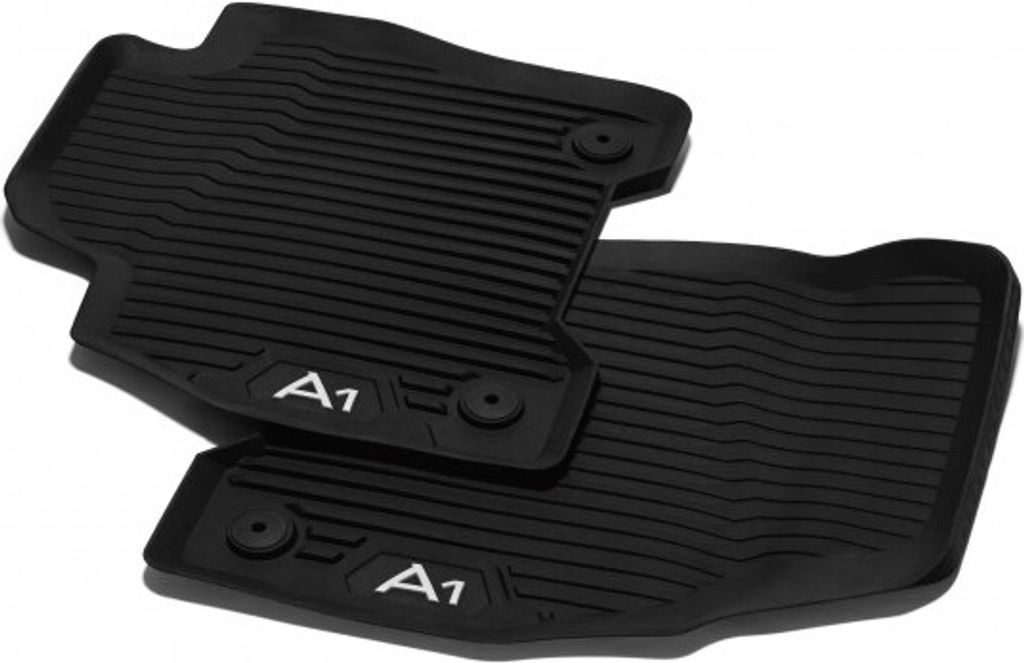 Two black rubber floor mats for a car.