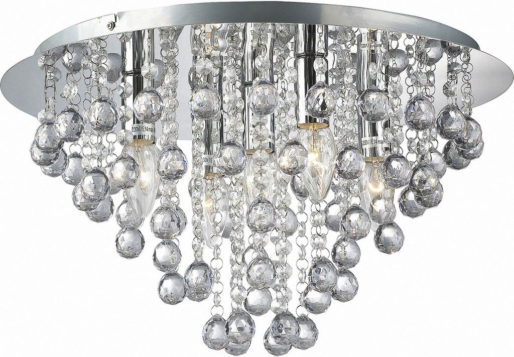 A close-up, studio shot of a crystal chandelier.