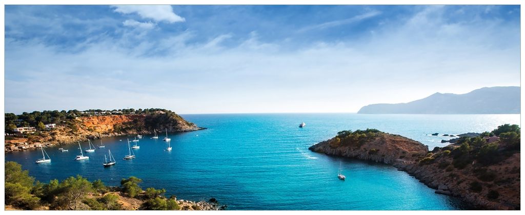 Wallario Wandbild aus Acryl, 200 x 80 cm, freischwebende Optik - Ibiza - Blick von einer Bucht aufs Meer