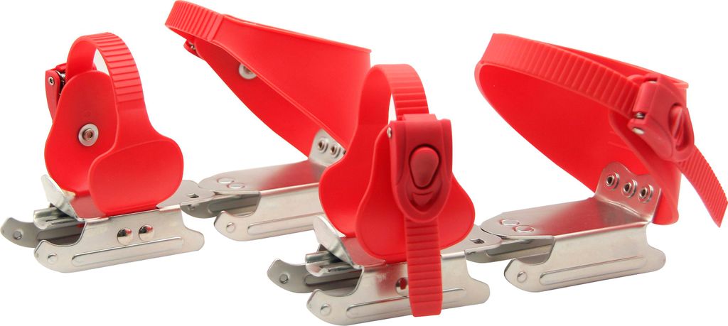 Three red children's skates are arranged diagonally on a white background.