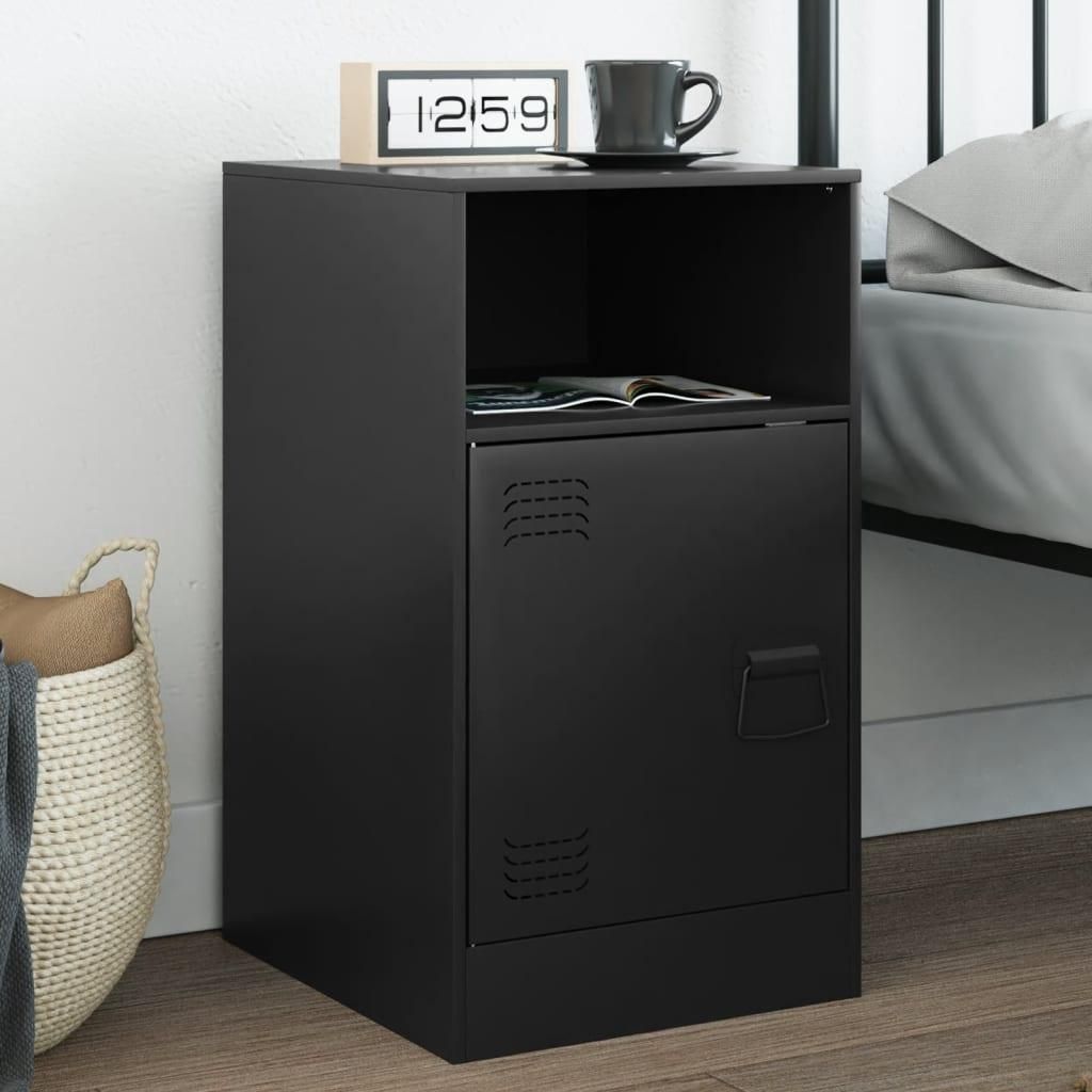 A black bedside table with a shelf and a cabinet door, placed next to a bed.
