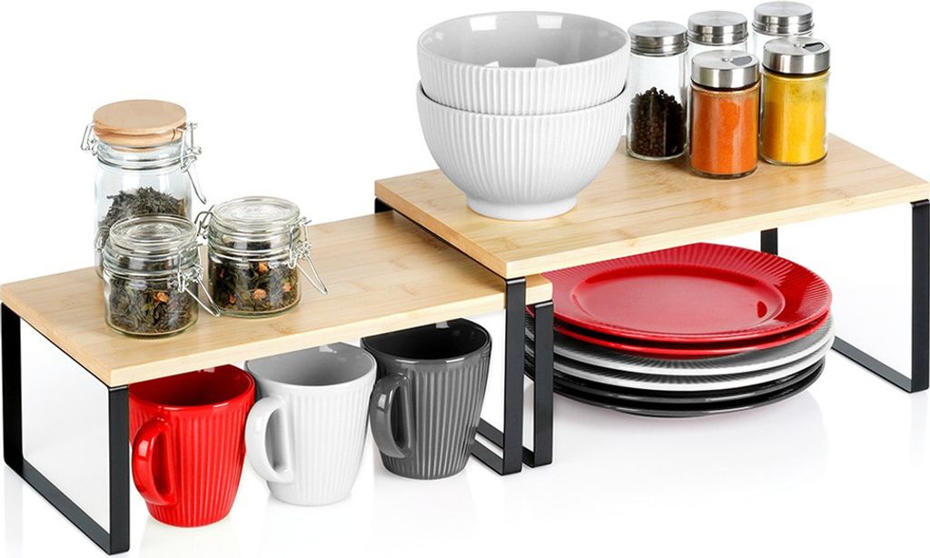 A kitchen shelf organizer with various kitchen items like bowls, plates, mugs, and jars.