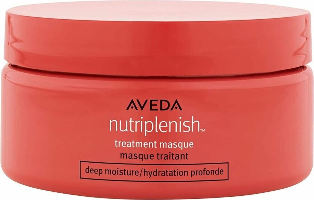 A product shot of a hair mask in a red jar.