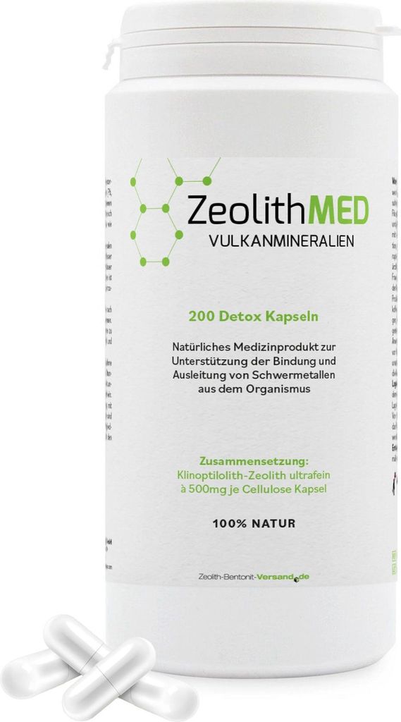 A white bottle of Zeolith MED Detox Kapseln with two capsules in the foreground.