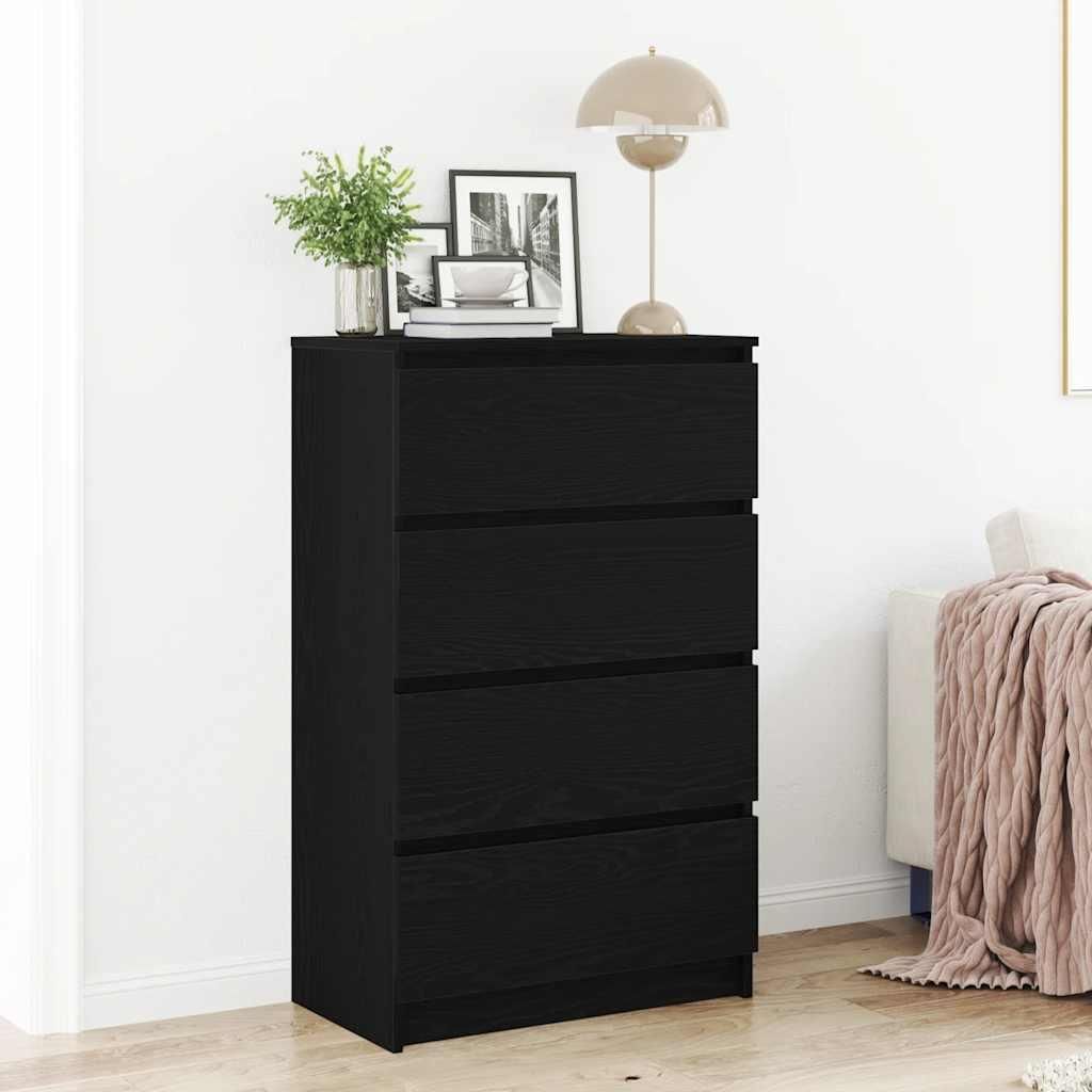 A black dresser with four drawers in a room setting.