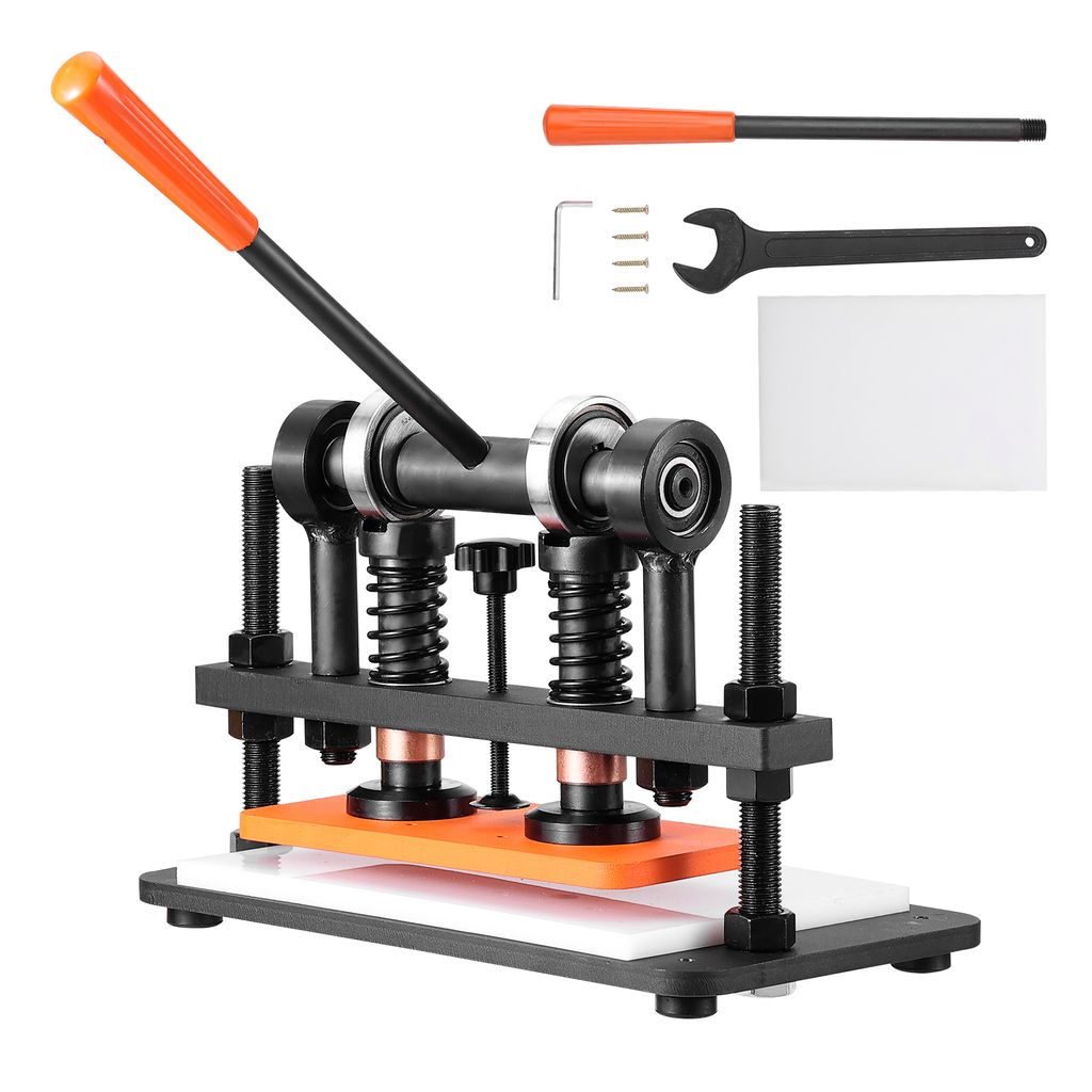 A manual leather cutting and embossing machine with accessories, displayed on a white background.