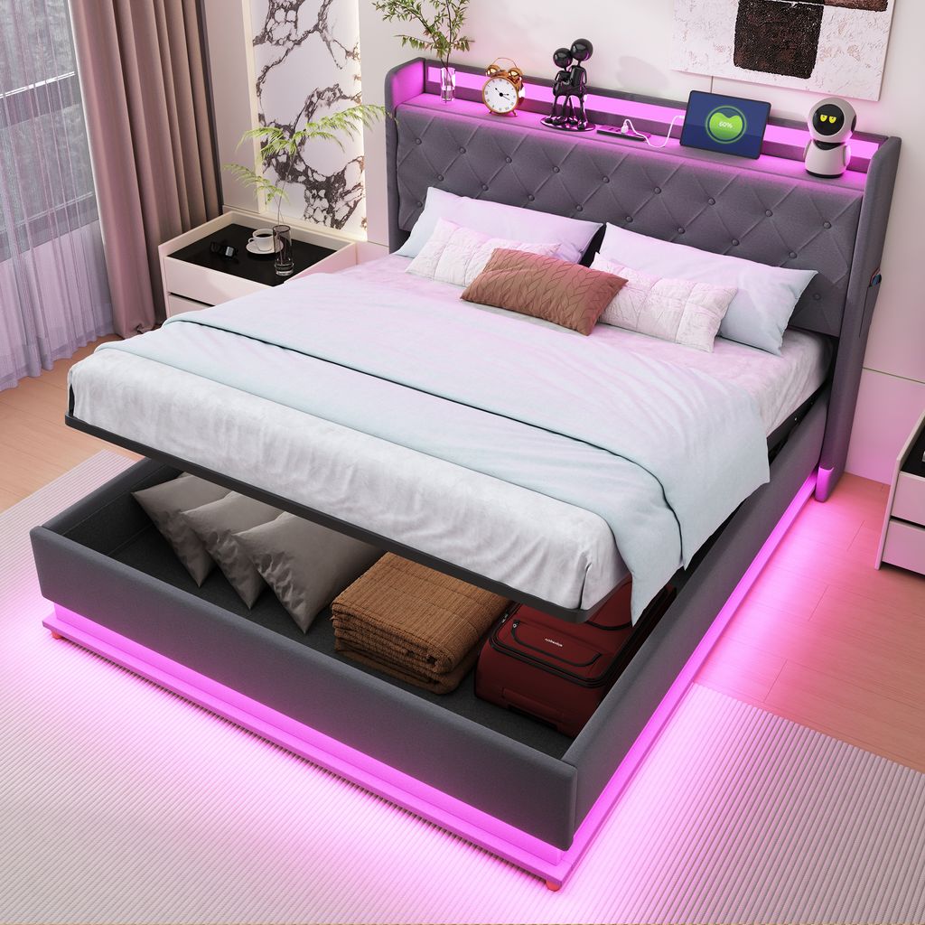 A modern bedroom with a grey upholstered bed frame with built-in storage and LED lighting.