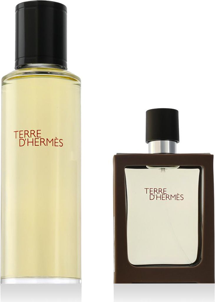 Two bottles of Hermès Terre D'hermes perfume are displayed against a white background.