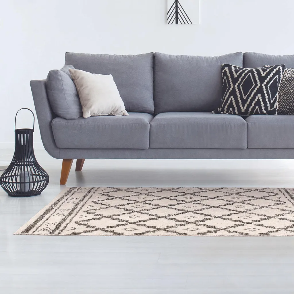 Grand tapis de salon Mirage 120x170 cm avec des motifs géométriques