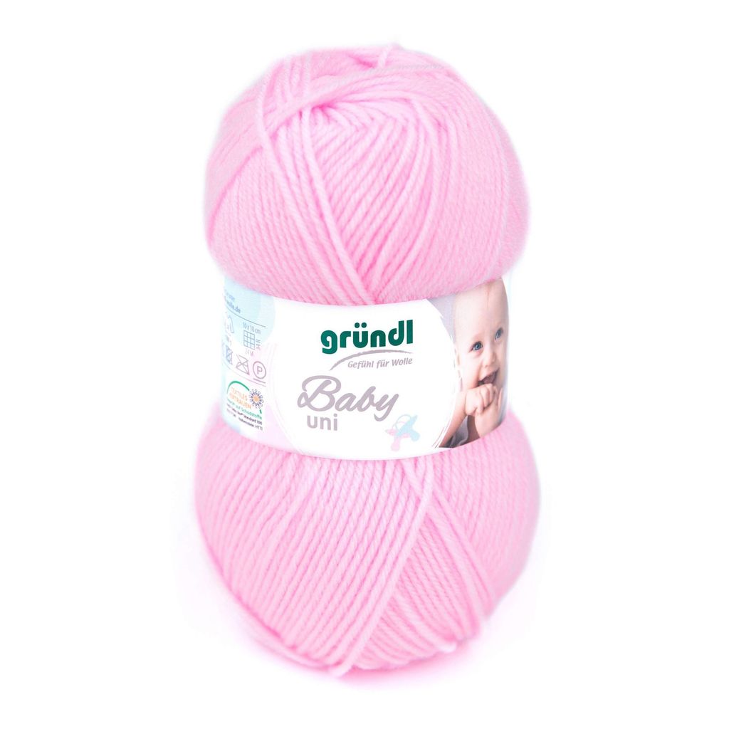 A ball of pink yarn with a label.