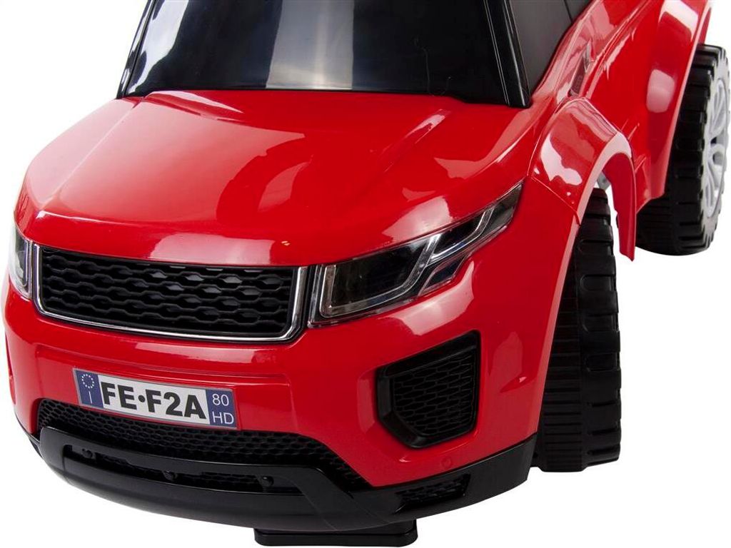 Close-up front view of a red toy car.